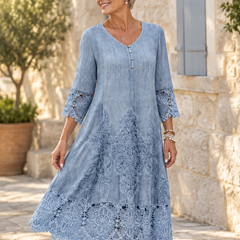 Blue lace midi dress in motion